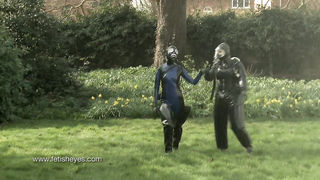 FETISH ARCHIVES Wet Weather Rubber Girls